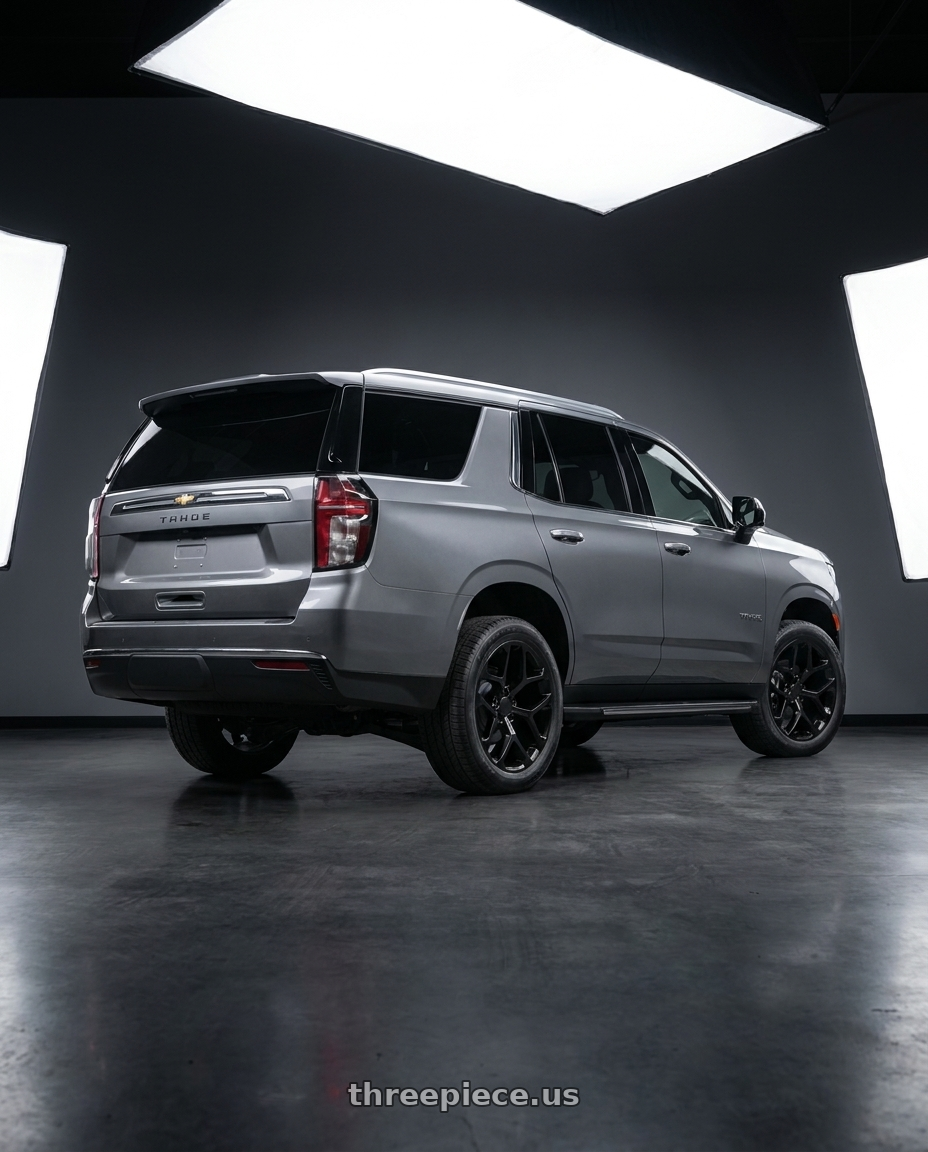 2021 Chevrolet Tahoe LS with REPLICA 348 6X139.7 22x9.5 +30 FULL BLACK wheels rear three quarter view square tires