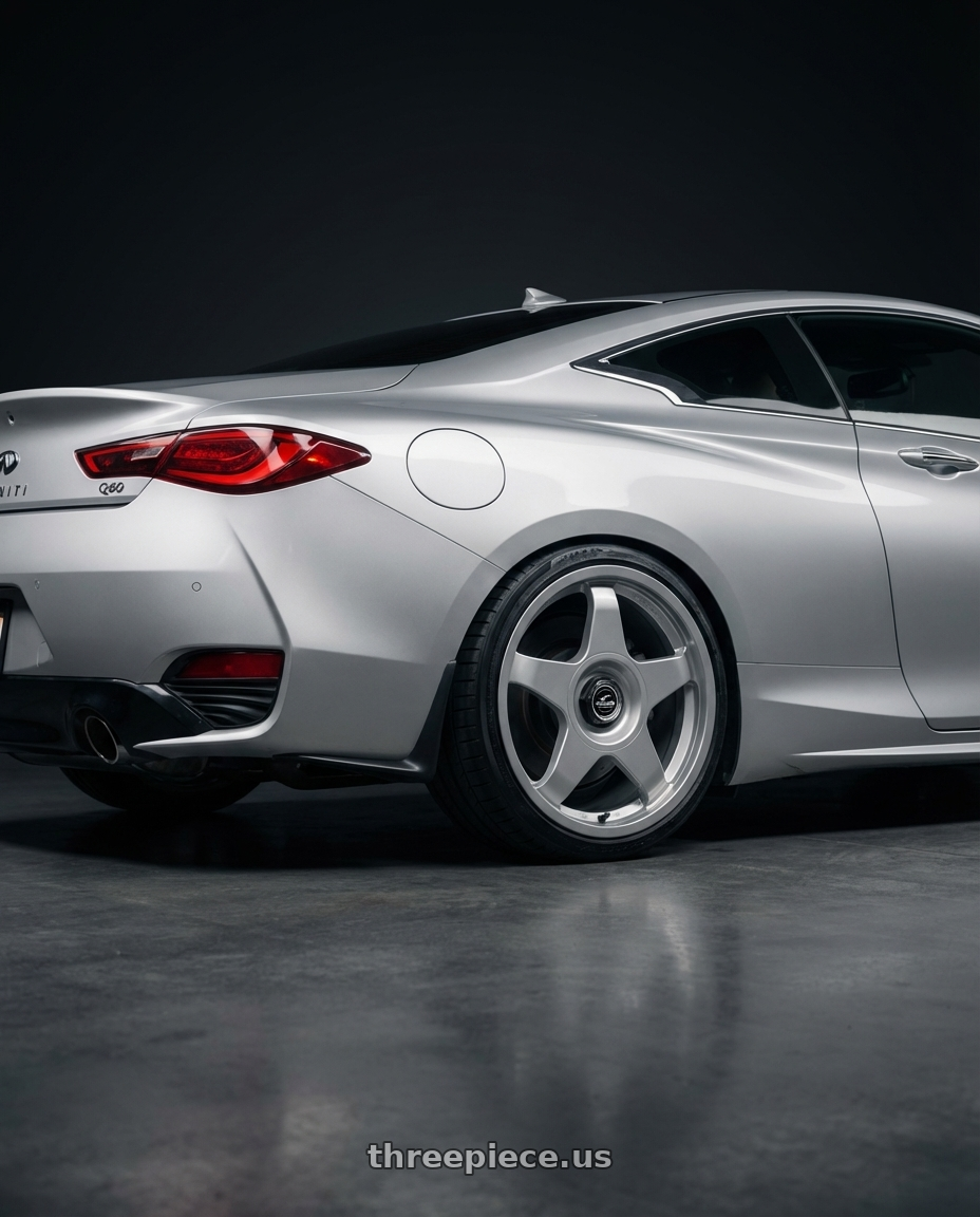 2020 Infiniti Q60 with fifteen52 CHICANE 5x114.3 / 5x120 19x8.5 +35 SPEED SILVER (GLOSS SILVER) wheels rear three quarter view square tires