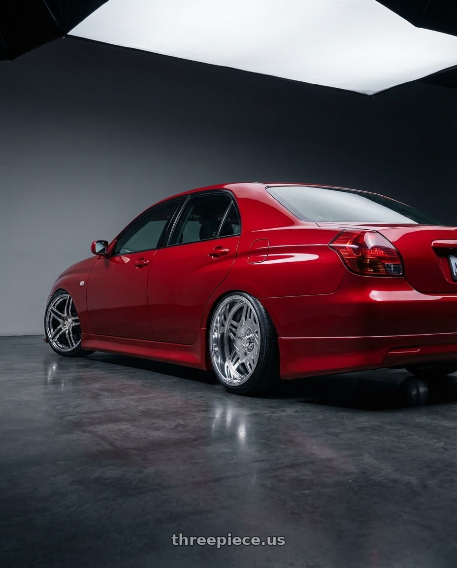 Toyota JZX110 Verossa 2002 Cherry Red with American Truxx Forged Orion ATF1908 8x180 24x14-76 Polished wheels rear three quarter view slight stretch tires