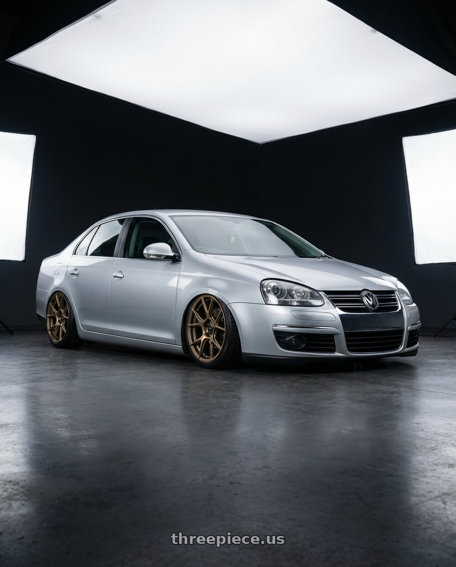 2009 Volkswagen Jetta GLI MK5 with Konig Ampliform 5x112 18x8.5+43 Gloss Bronze wheels