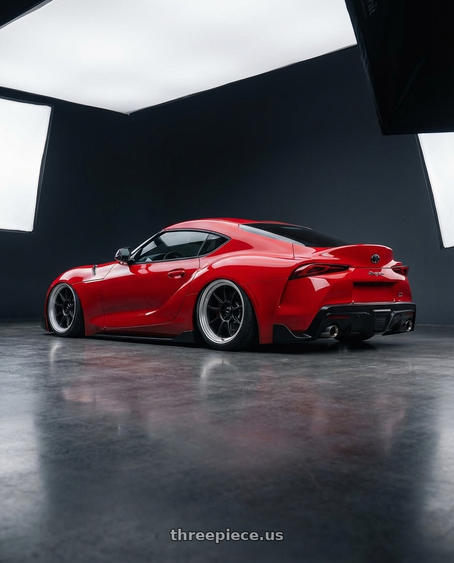 2023 Toyota GR Supra with Konig Countergram 5x112 19x9.5+30 Matte Black / Matte Machined Lip wheels rear three quarter view slight stretch tires