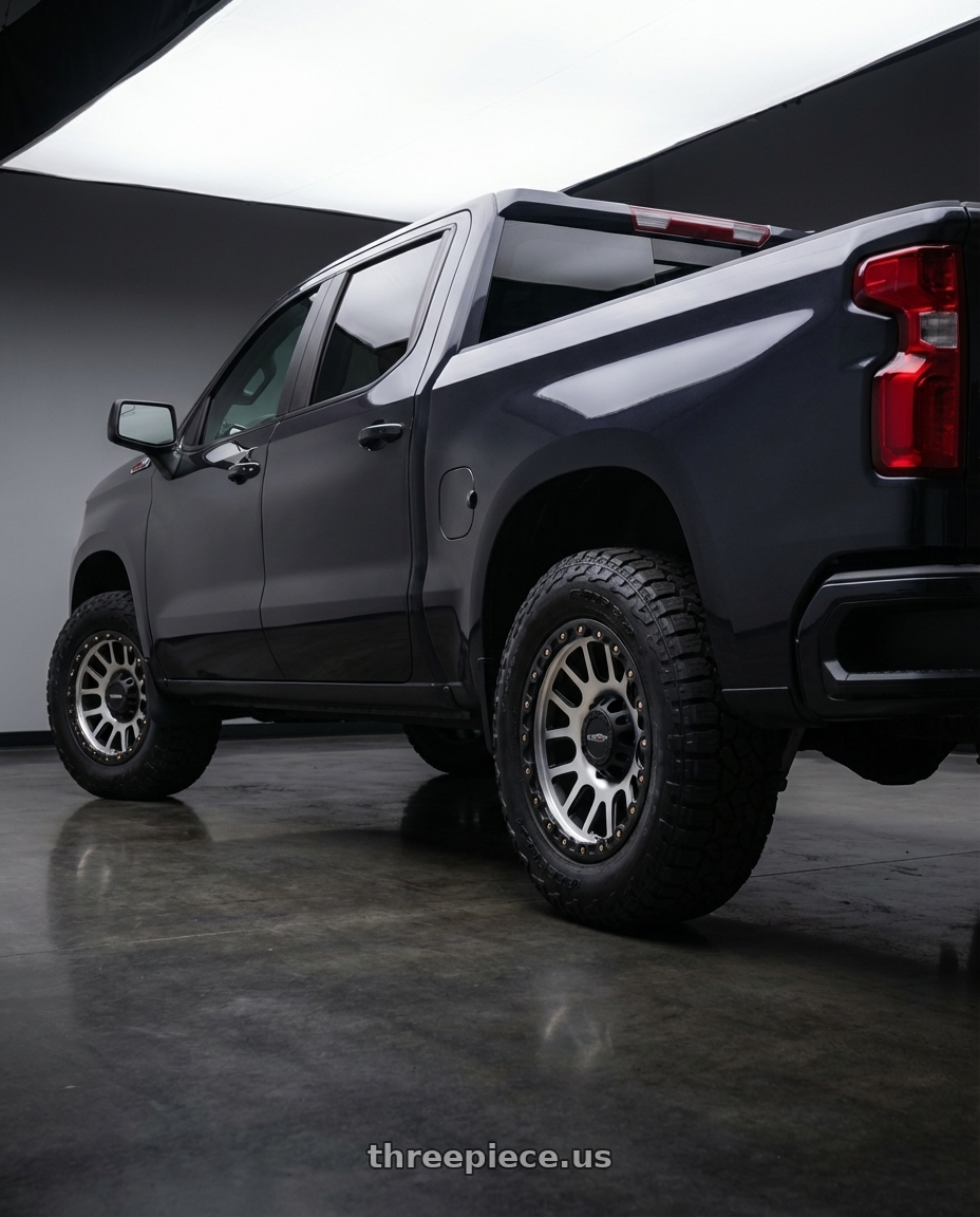 2023 Chevrolet Silverado 1500 with Vision Off-Road 111 Nemesis 6x139.7 20x9+10 Matte Black Machined Face wheels rear three quarter view meaty tires