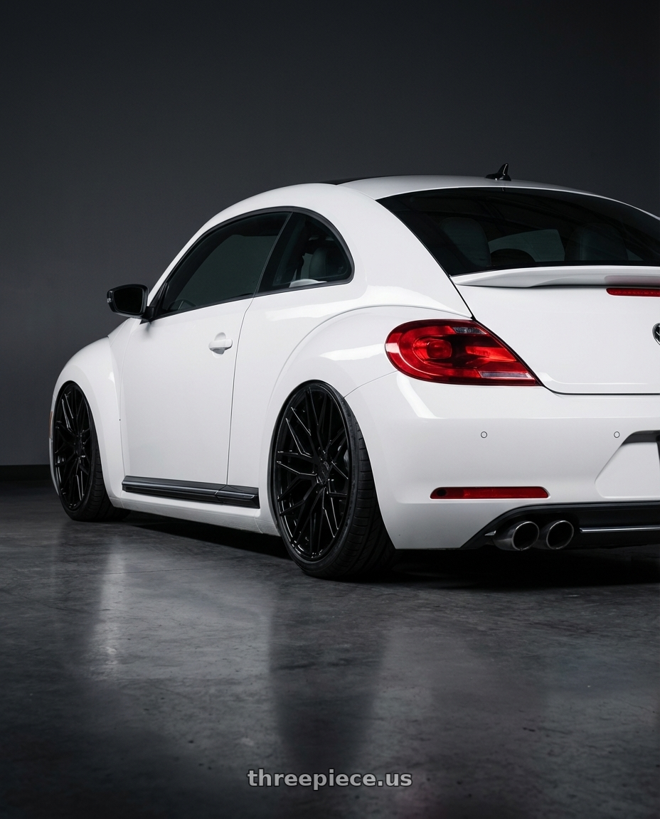 2016 Volkswagen Beetle Turbo with Avant Garde Wheels M520R 5X112 19x9.5 +40 Gloss Black wheels rear three quarter view slight stretch tires