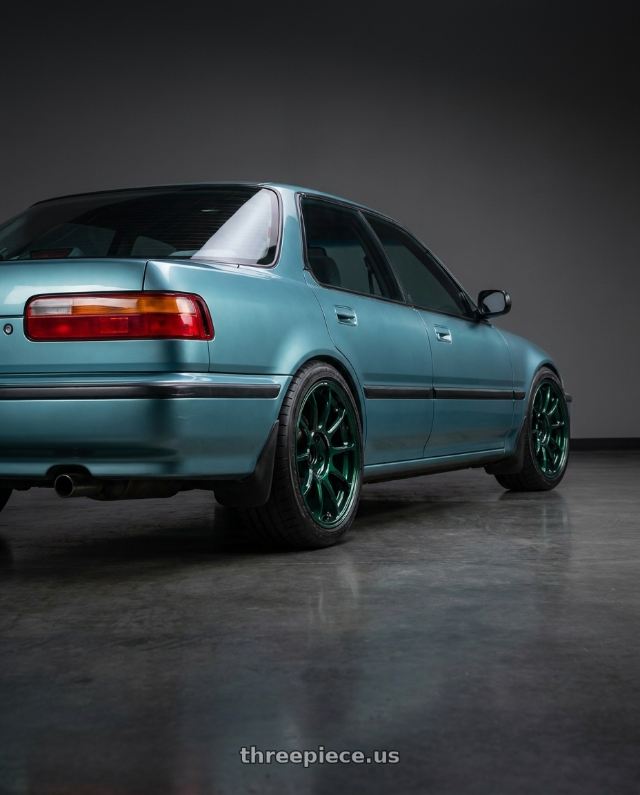1990 Acura integra with Volk Racing ZE40 4x100 16x7+36 Racing Green wheels rear three quarter view square tires