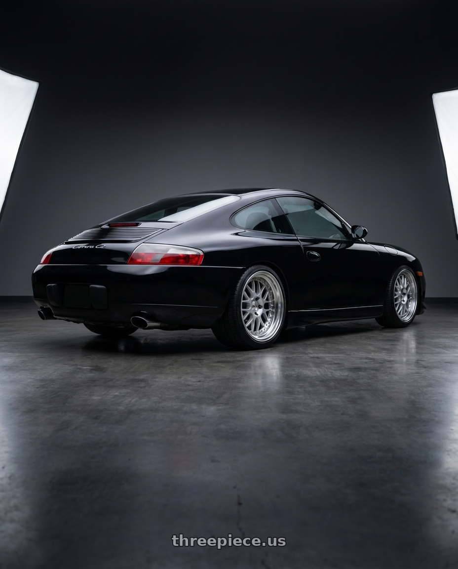 2000 Porsche 911 Carrera C2 with Work Meister M1 3p 5x130 18x9.5+46 H Disk Silver wheels rear three quarter view square tires