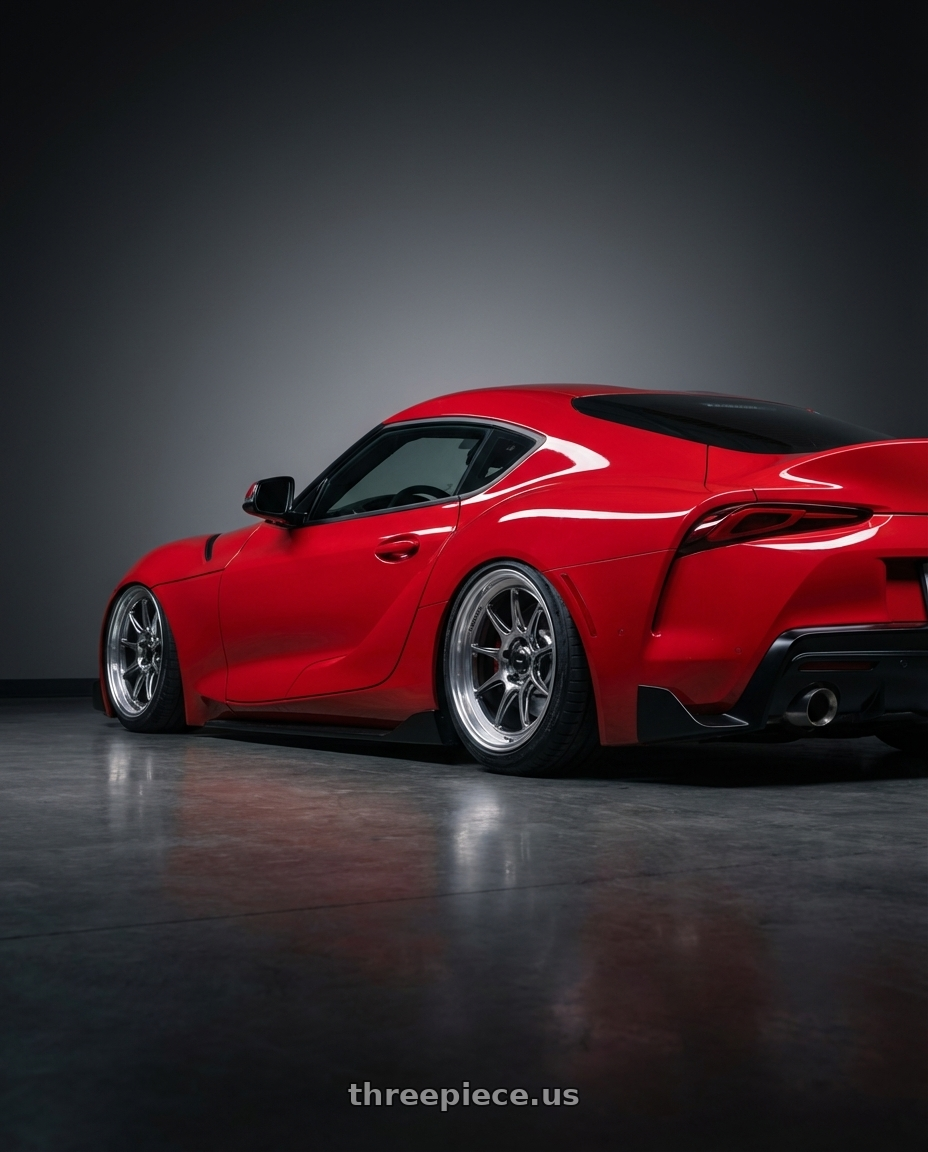 2023 Toyota GR Supra with Konig Countergram 5x112 19x11+40 Hyper Chrome / Machined Lip wheels rear three quarter view slight stretch tires