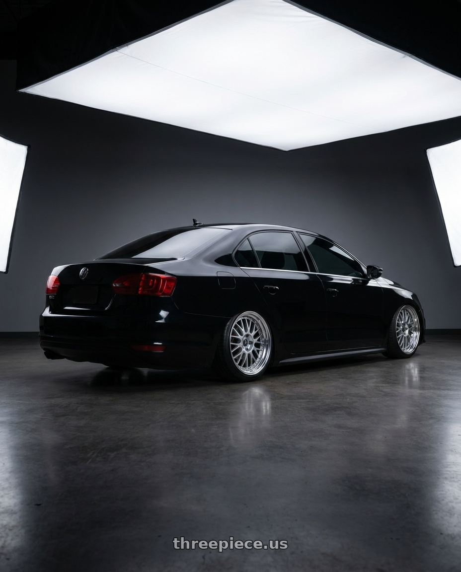 2012 Volkswagen Jetta GLI with SSR Professor MS1 5x112 18x8.5+43 SL Disk Silver wheels rear three quarter view slight stretch tires