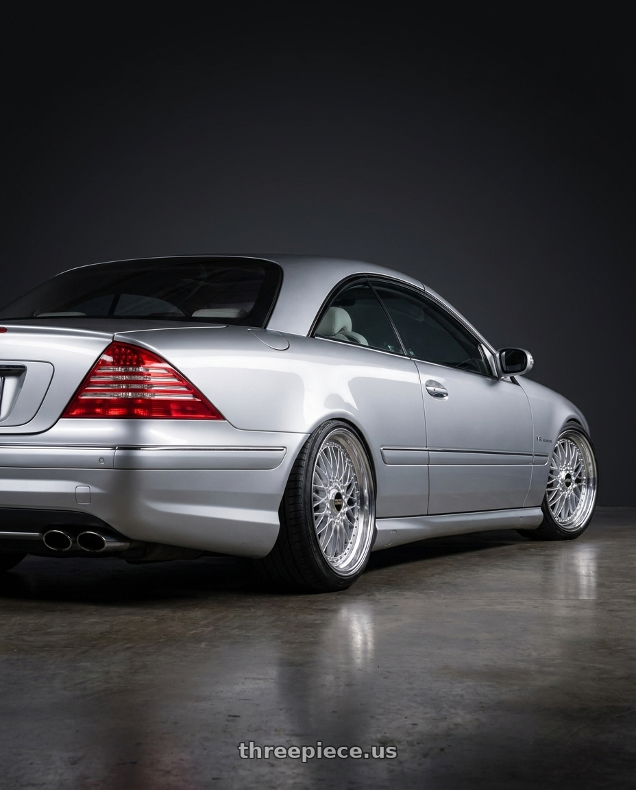 2005 Mercedes CL65 AMG with BBS Super 5x112 19x10 +40 Diamond Silver wheels rear three quarter view extreme stretch tires