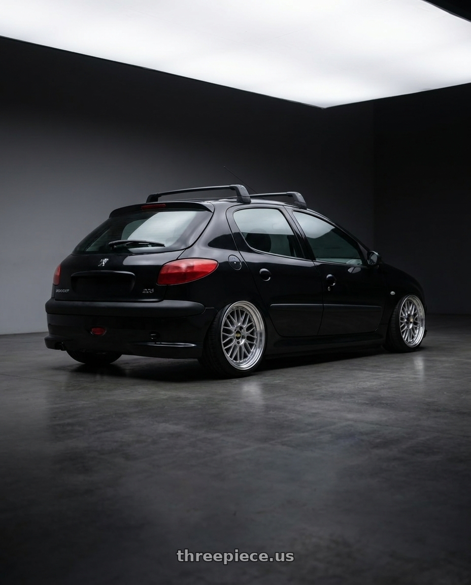 2005 Peugeot 206 Black with BBS LM 4x100 17x7.5+40 Diamond Silver wheels rear three quarter view square tires