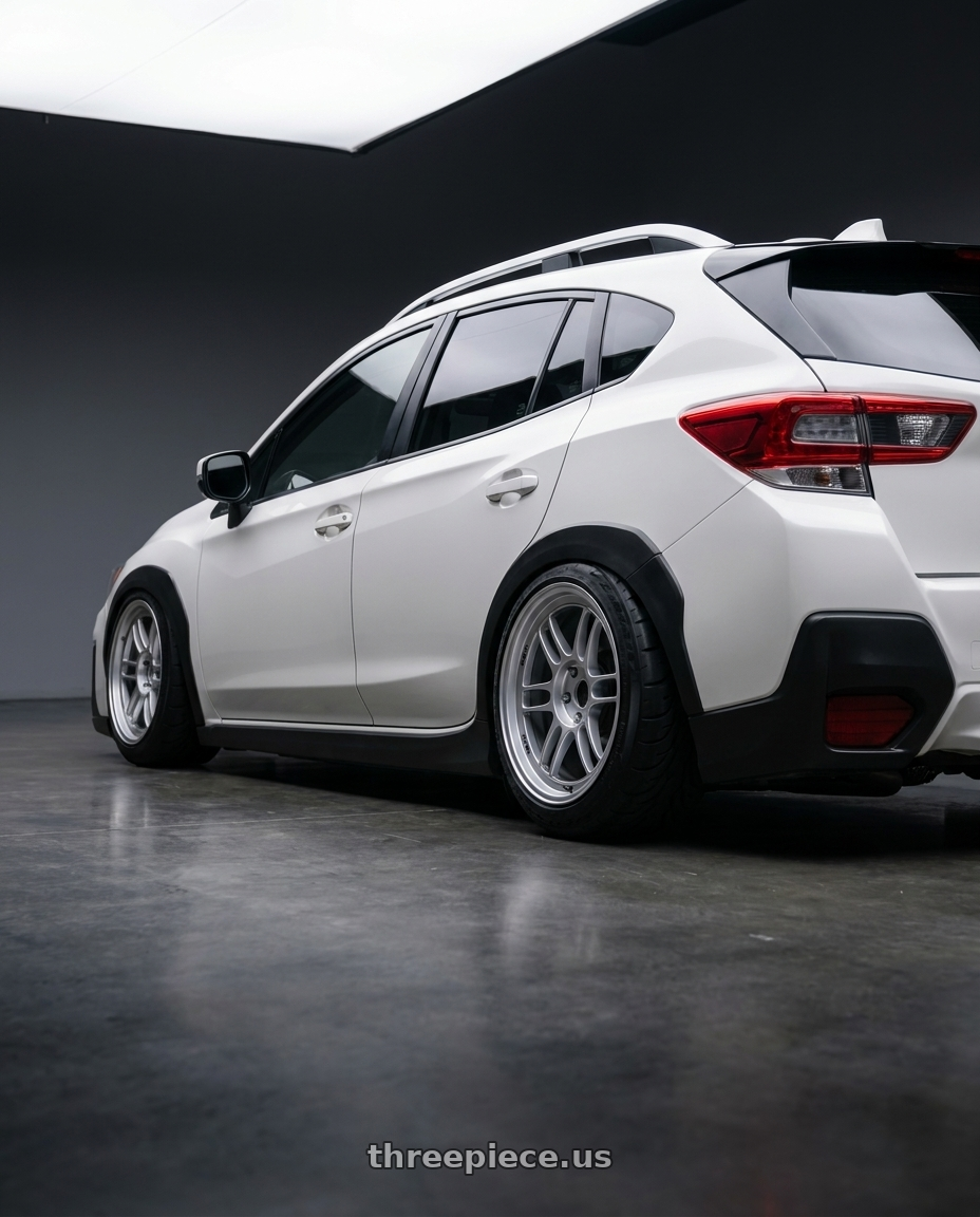 2022 SUBARU XV with Enkei RPF1 4x100 17x7+35 Silver wheels rear three quarter view meaty tires