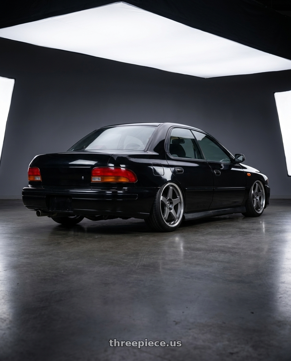 1998 Subaru Impreza GC8 with Motegi MR151 CS5 5X100 18X8.5 +30 GUNMETAL WITH MACHINED LIP wheels rear three quarter view slight stretch tires