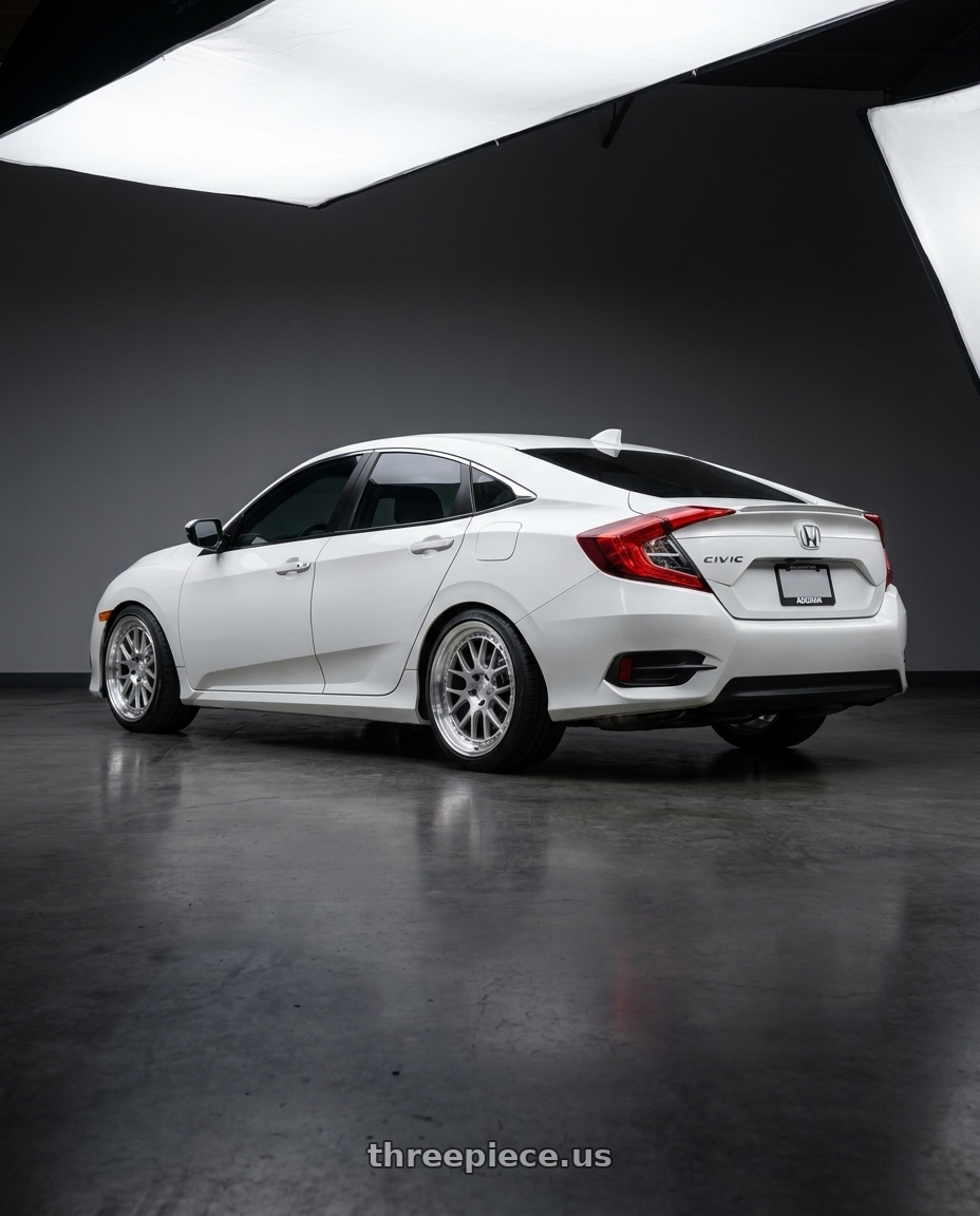 2016 Honda civic with Aodhan DS06 5x114.3 18x8.5+35 Silver w/Machined Face wheels rear three quarter view square tires