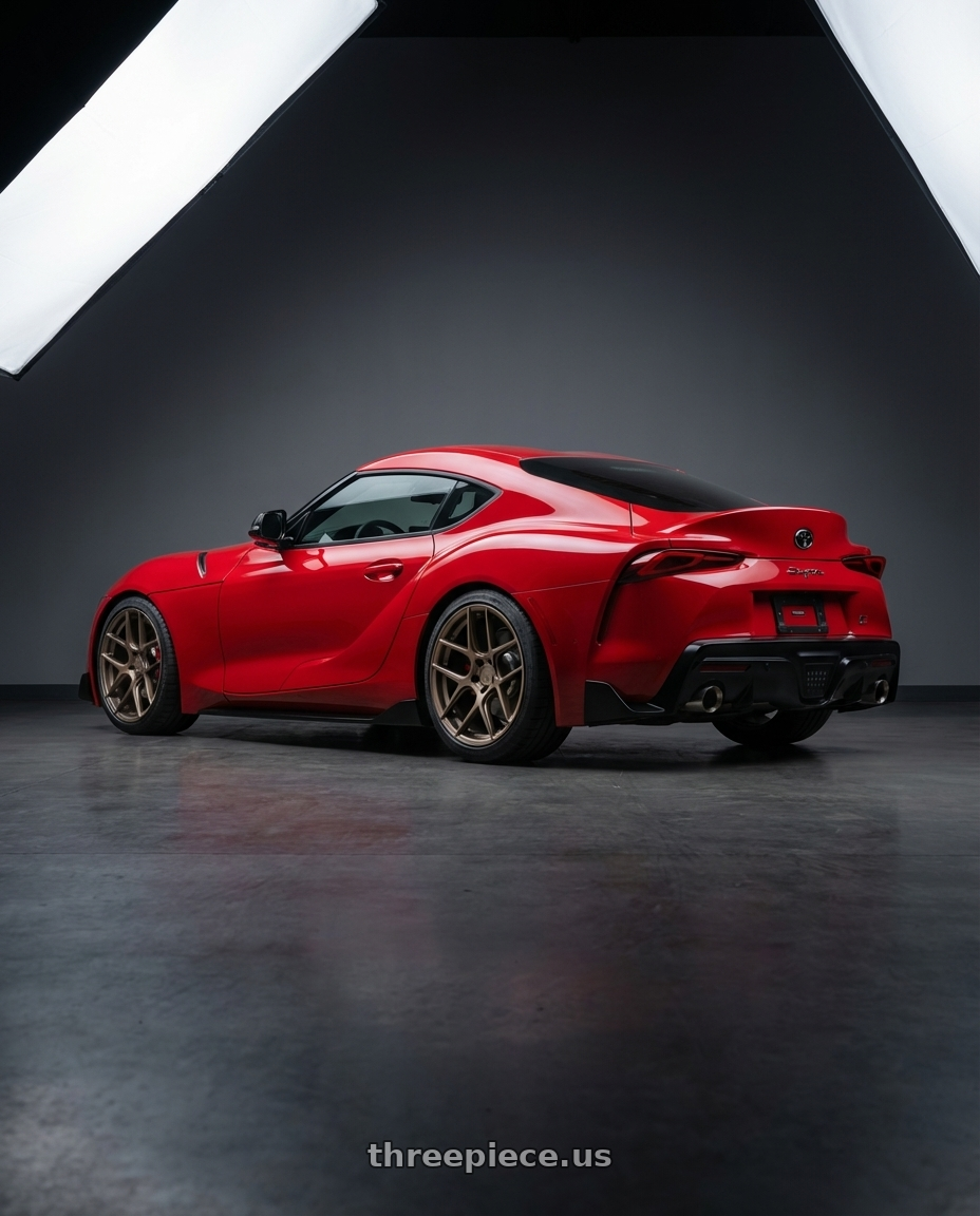 2023 Toyota GR Supra with Aodhan AFF2 5x112 19x9.5+35 Matte Bronze wheels rear three quarter view square tires