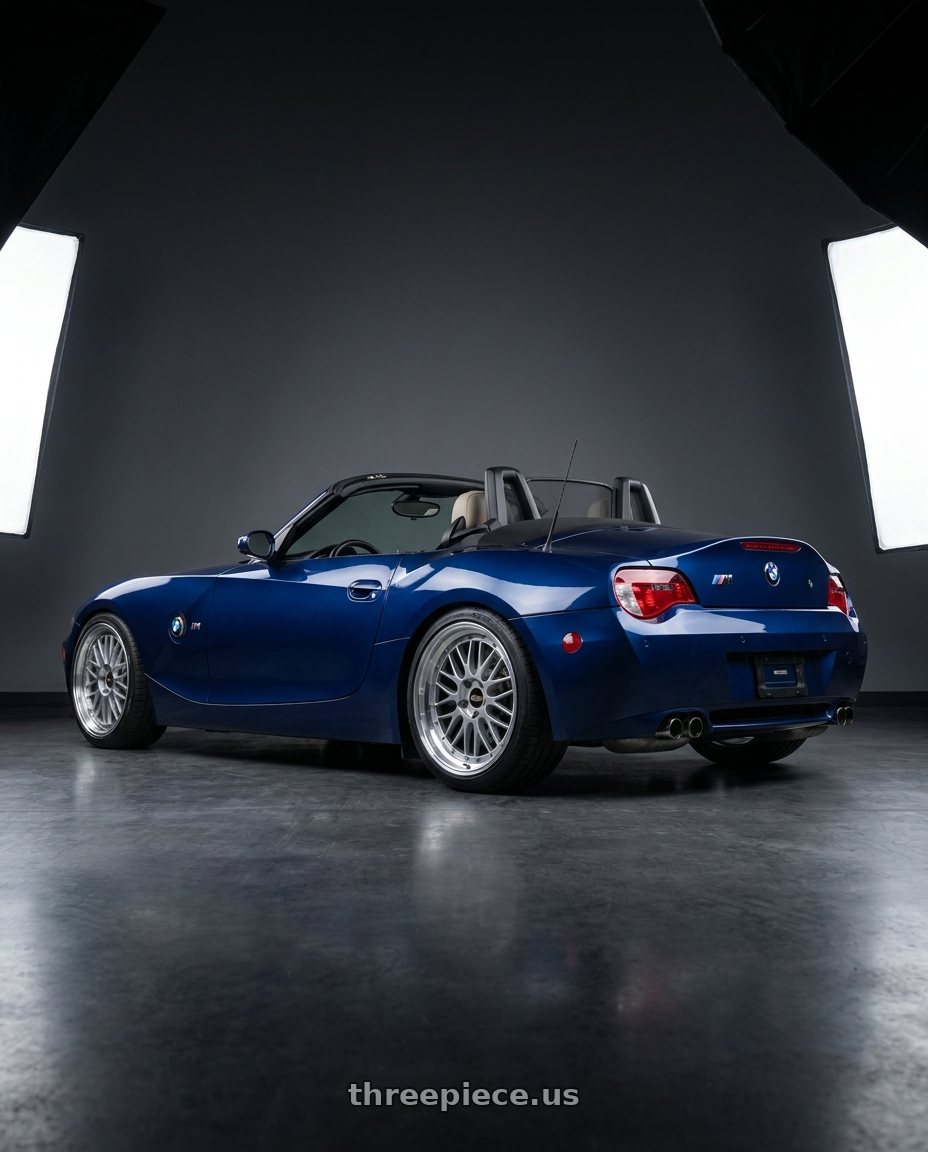 2006 BMW Z4 M with BBS LM 5x114.3 18x9.5+38 Diamond Silver wheels rear three quarter view square tires