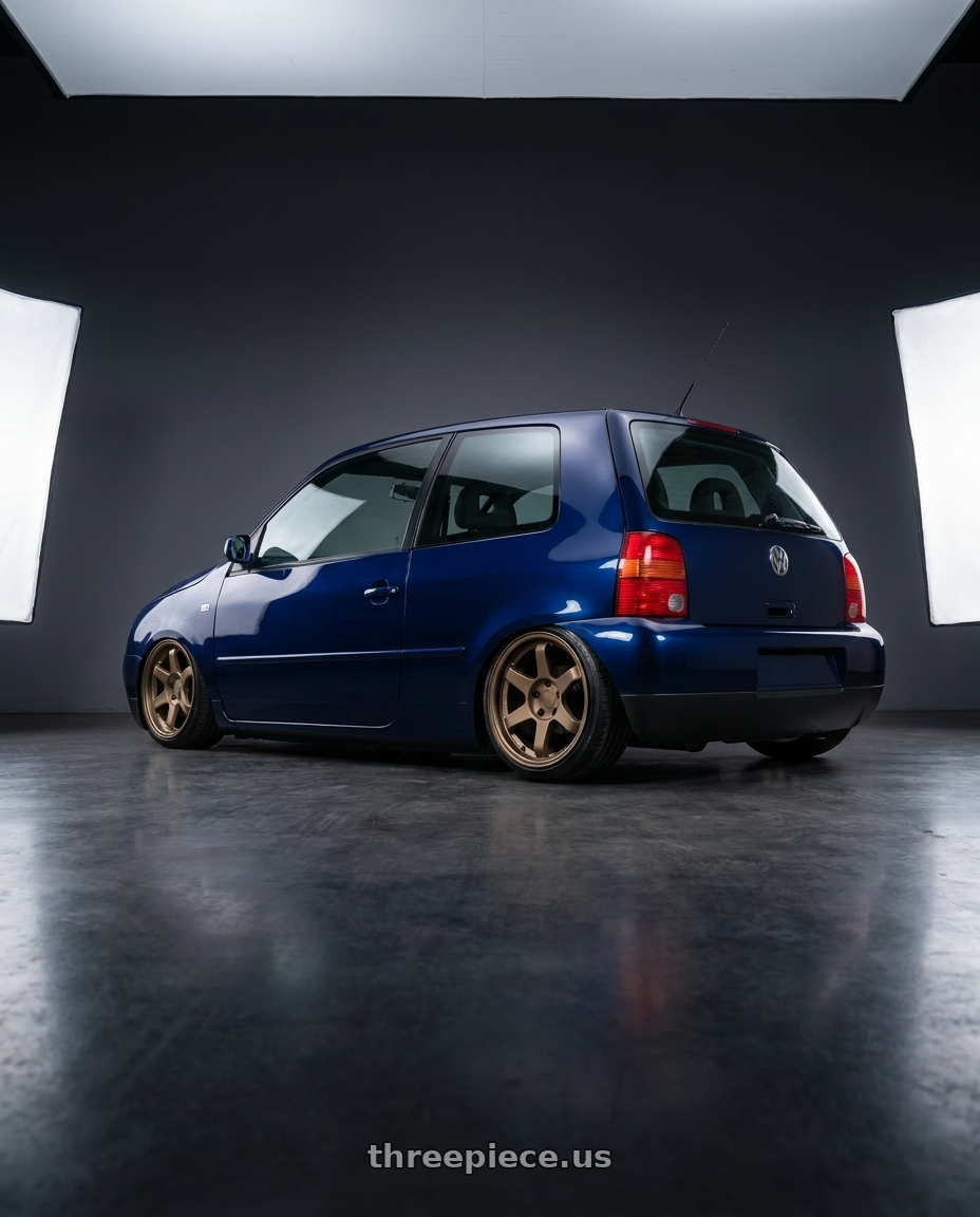 2004 Vw Lupo with 9six9 SIX-1 5x112 19X10 +35 Matte Bronze wheels rear three quarter view slight stretch tires