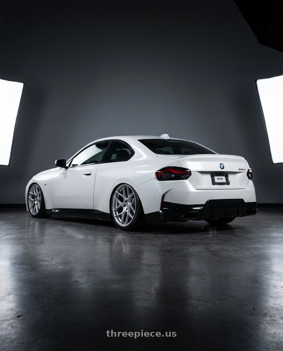 2024 BMW 2 Series G42 with Aodhan AFF2 5x112 19x8.5+35 Gloss Silver Machined Face wheels rear three quarter view slight stretch tires