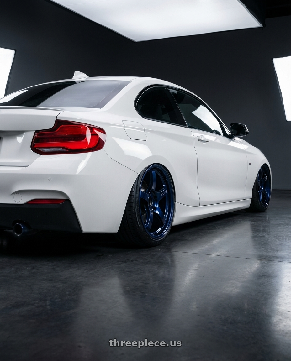 2018 BMW 2 Series F22 with Gram Lights 57CR 5x120 19x9.5+45 Eternal Blue Pearl wheels rear three quarter view slight stretch tires