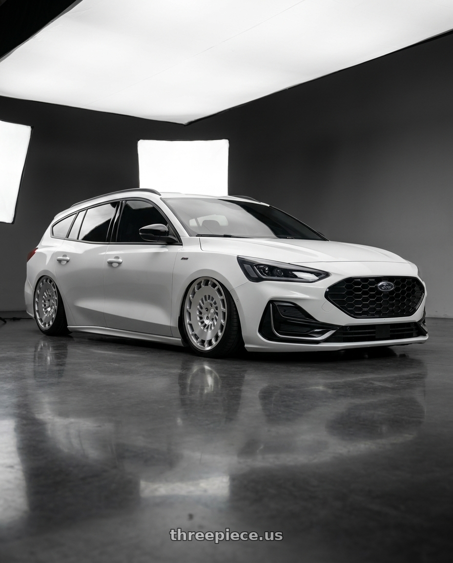 2023 ford focus wagon with Rotiform 1PC R135 CCV 5X112 19X8.5 +45 GLOSS SILVER MACHINED wheels front three quarter view stanced stance