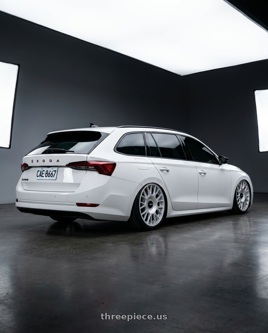 2025 SKODA OCTAVIA with Rotiform 1PC R188 TUF-R 5X112/5X114.3 19X8.5 +45 SILVER wheels rear three quarter view slight stretch tires