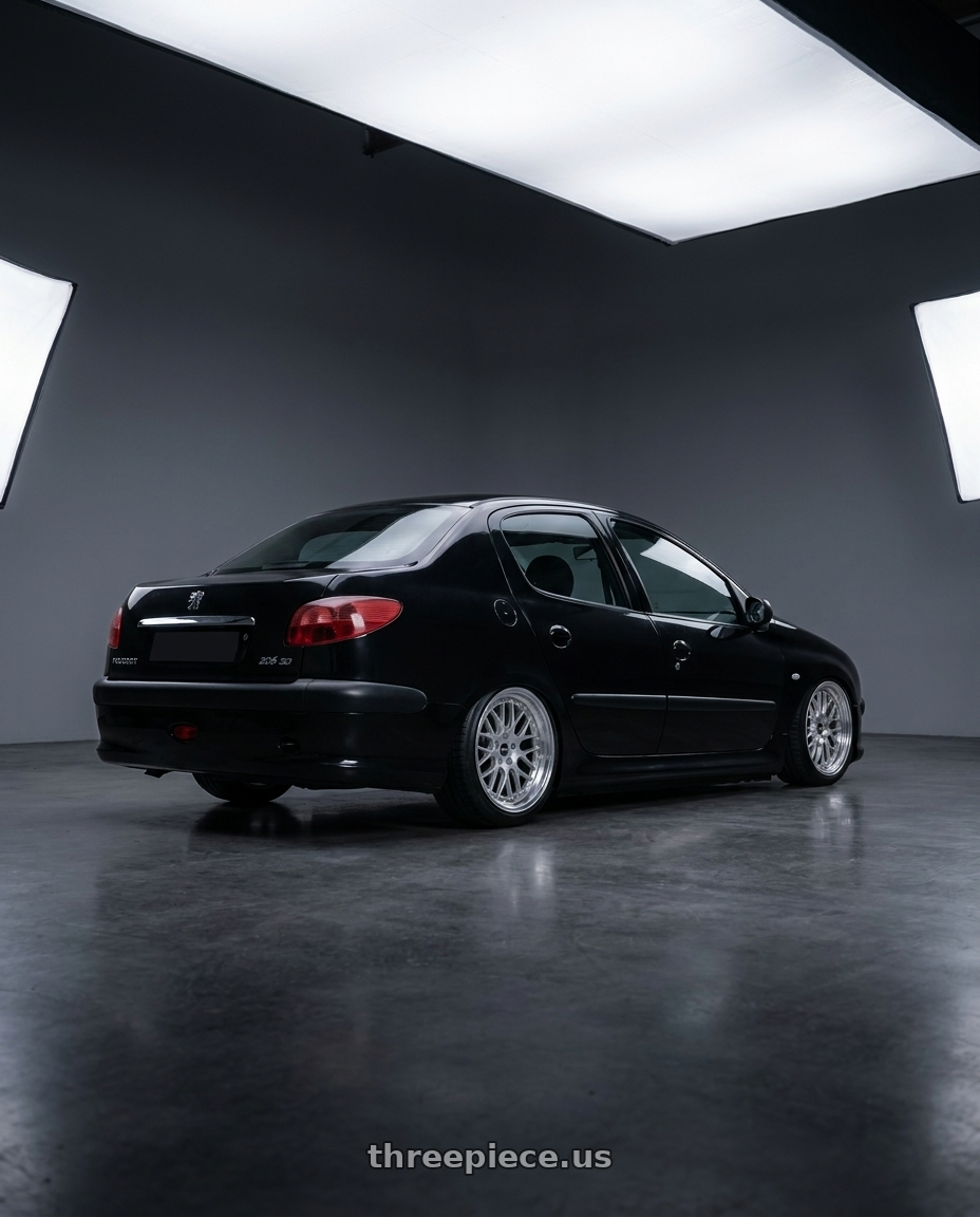 2011 Peugeot 206 SD with ESR Wheels CS SERIES CS01 5x100 18x8.5 +30 Hyper Silver wheels rear three quarter view square tires