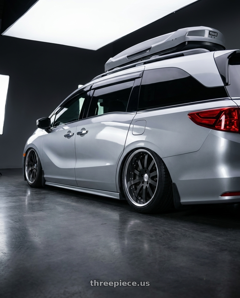 2024 Honda Odyssey with Work Equip E10 5x120 20x8.5+40 a disk Black Anodized wheels rear three quarter view slight stretch tires