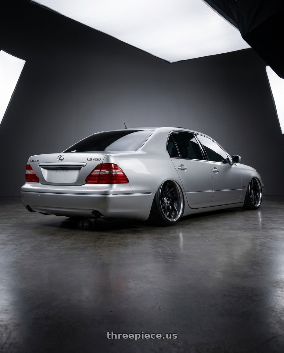 2004 lexus ls430 with Work Gnosis Cvs 5x114.3 19x9+38 A Disk Matte Black wheels rear three quarter view extreme stretch tires
