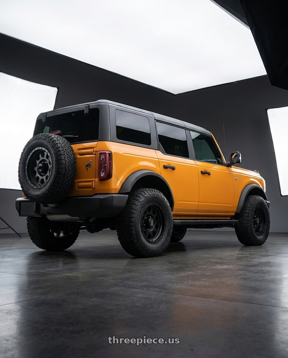 2024 Ford Bronco with XD XD122 ENDURO 6X139.7 17X9 -6 MATTE BLACK wheels rear three quarter view meaty tires