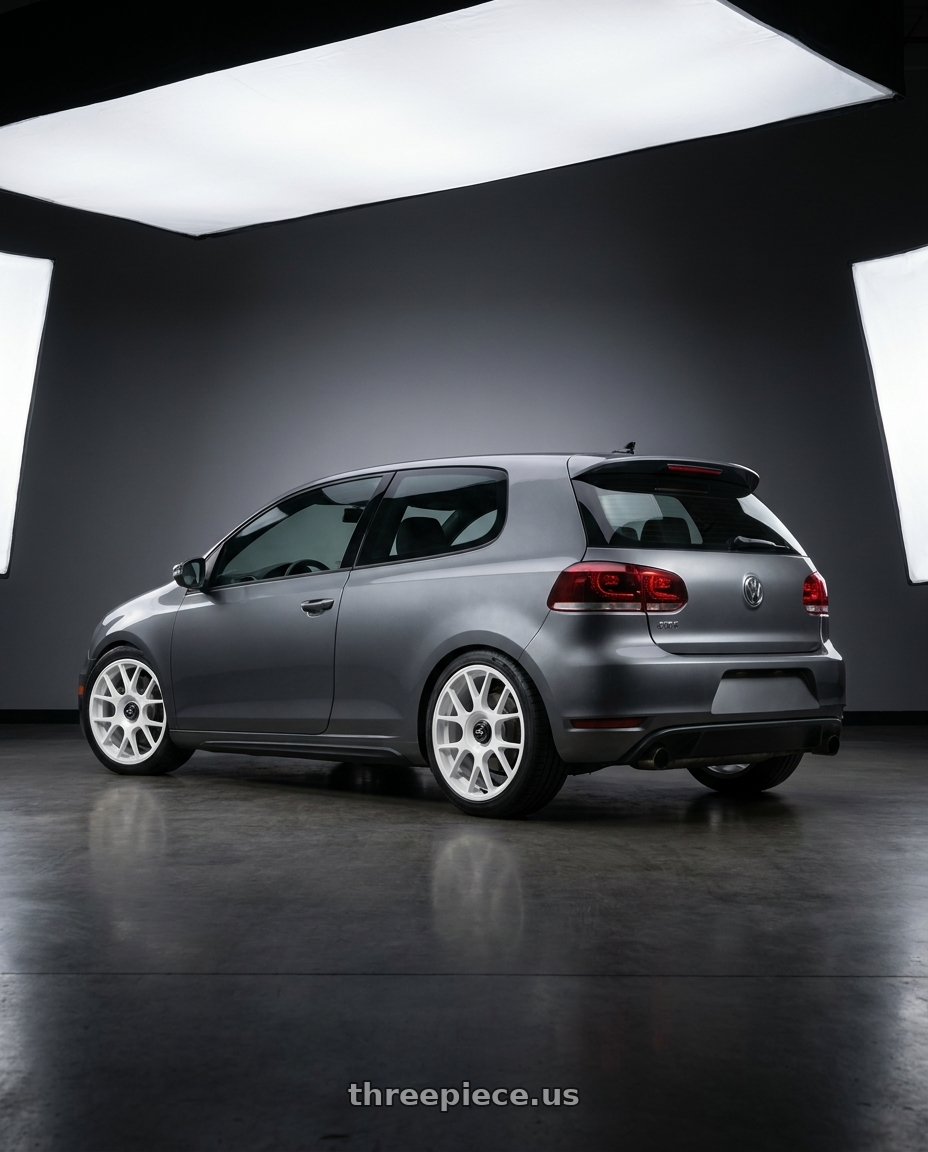 2013 Volkswagen GTI MK6 with fifteen52 APEX 5x112 / 5x120 18x8.5 +35 RALLY WHITE (GLOSS WHITE) wheels rear three quarter view square tires