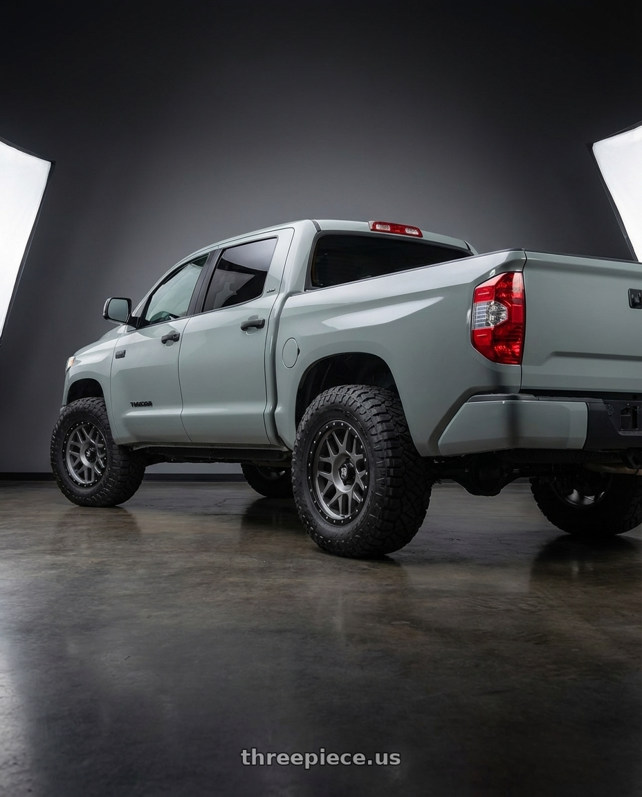 2018 Toyota Tundra with XD XD127 BULLY 5X150 20X9 +0 MATTE GRAY BLACK RING wheels rear three quarter view meaty tires