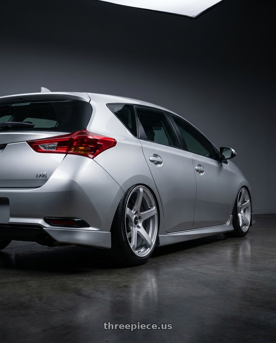 2016 Scion iM with Enkei Kojin 5x114.3 17x8+35 Matte Silver wheels rear three quarter view slight stretch tires