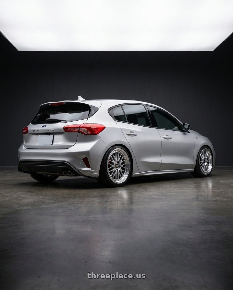 2023 ford focus silver with BBS LM 5x114.3 18x8.5+38 Diamond Silver wheels rear three quarter view square tires