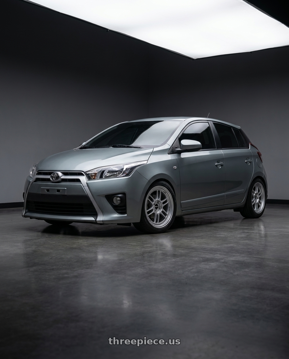 2015 Toyota Yaris with Enkei RPF1 4x100 16x8+38 Silver wheels