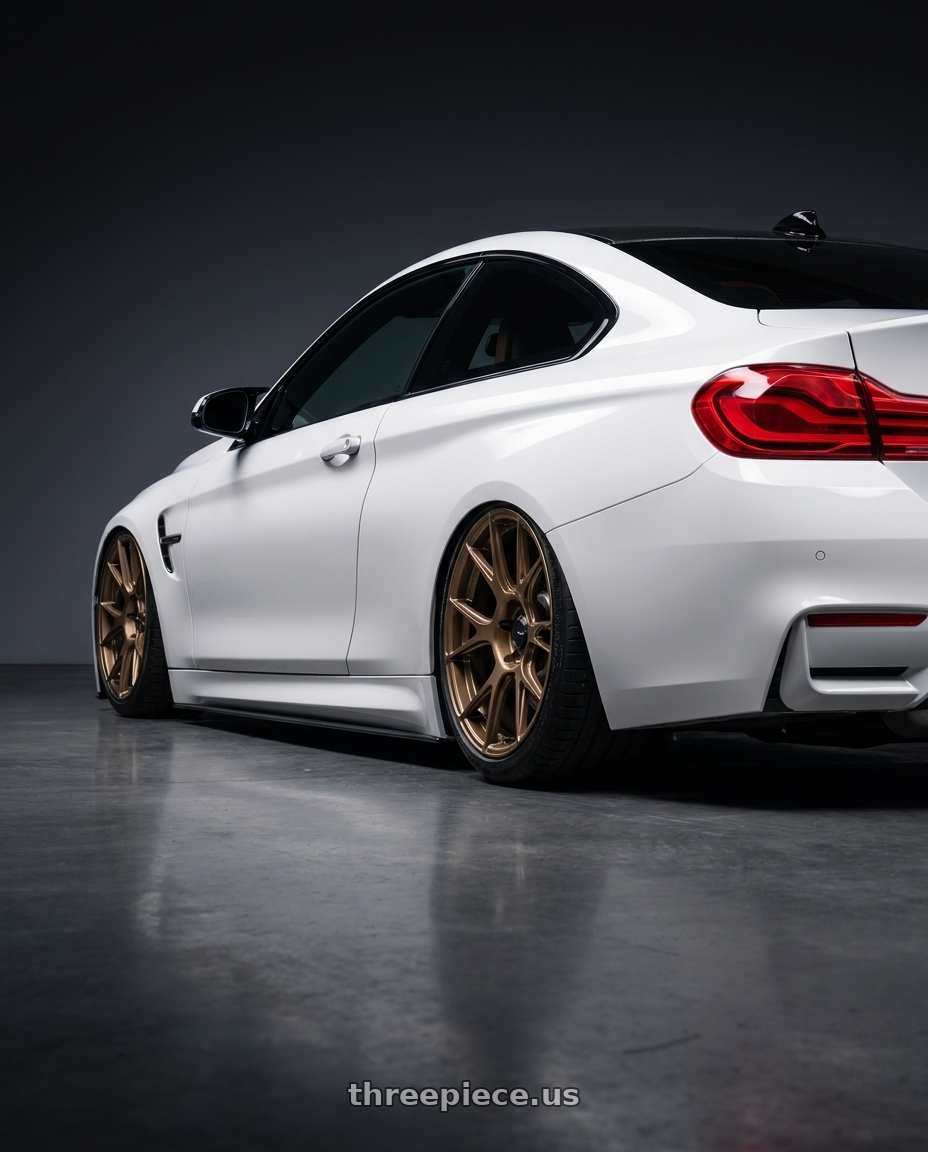 2018 BMW M4 F82 with Konig Ampliform 5x120 19x8.5+32 Gloss Bronze wheels rear three quarter view slight stretch tires