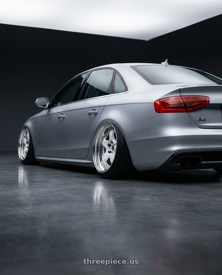 2016  Audi A4  with Work Meister S1 3P 5x112 18x8.5+35 L Disk White wheels rear three quarter view extreme stretch tires
