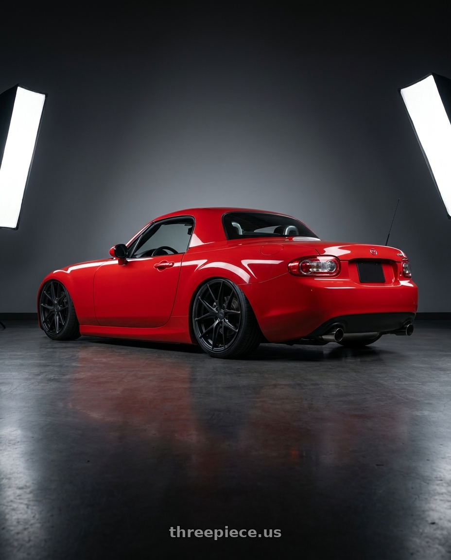 2012 Mazda MX-5 Miata NC with Niche 1PC M117 MISANO 5X114.3 17X8 +40 MATTE BLACK wheels rear three quarter view slight stretch tires