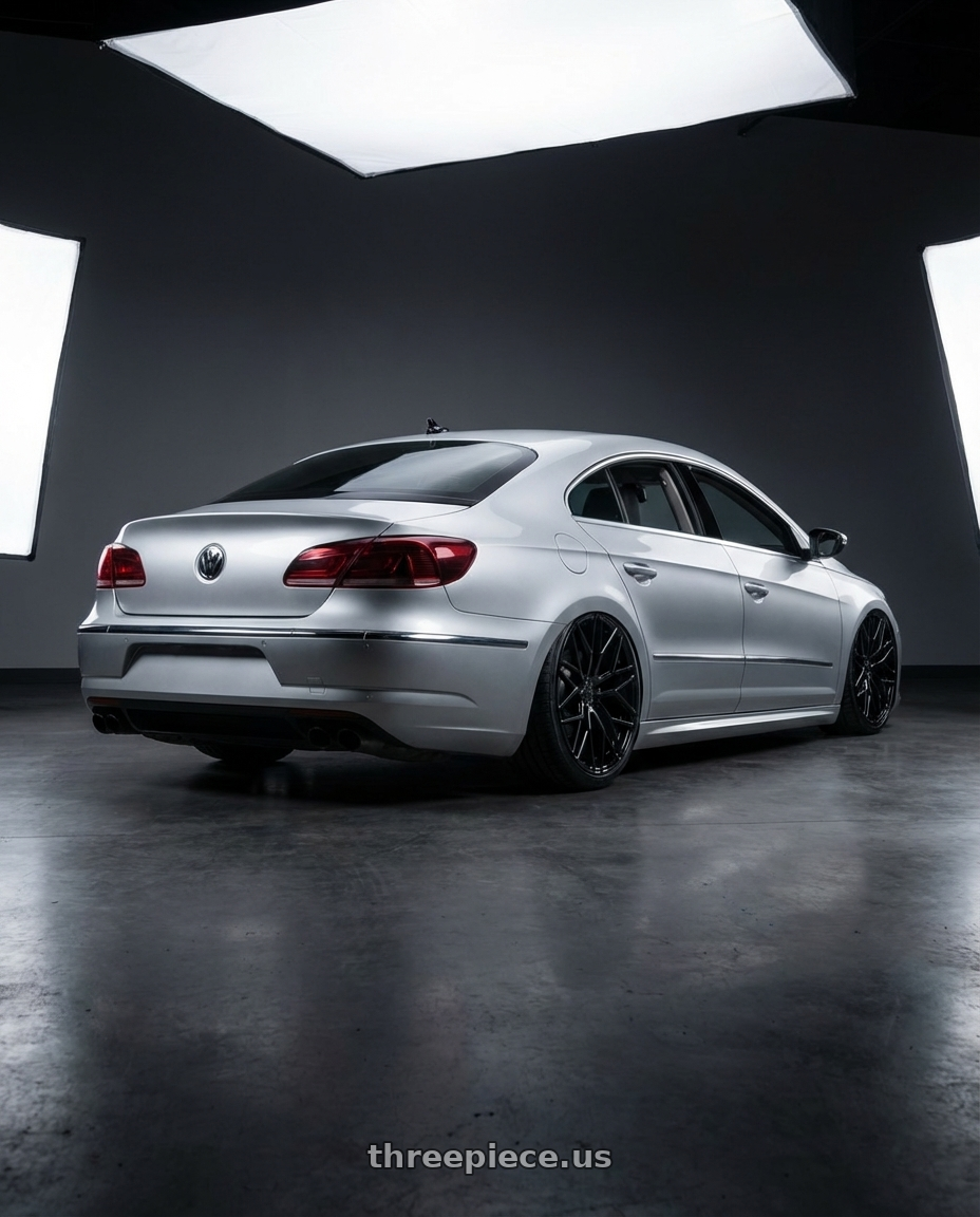 2015 Volkswagen CC with Avant Garde Wheels M520R 5X112 19x9.5 +40 Gloss Black wheels rear three quarter view slight stretch tires