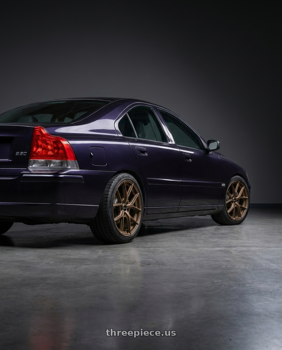 2005 Volvo S60 with Vors TR88 5x108 18x8.5 +35 Bronze wheels rear three quarter view square tires