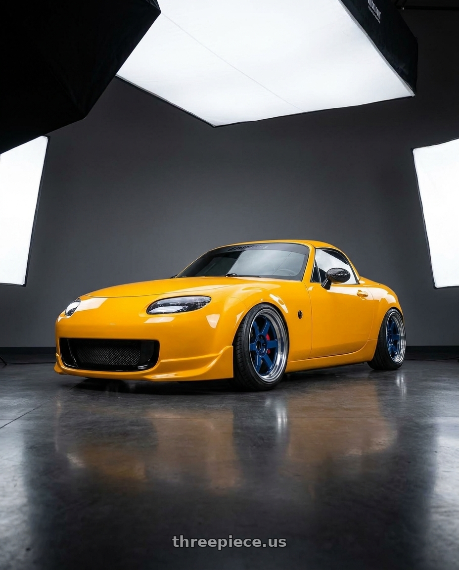2007 Mazda Miata with Volk Racing TE37V MK-II 5x100 18x9.5-14 Mag Blue wheels
