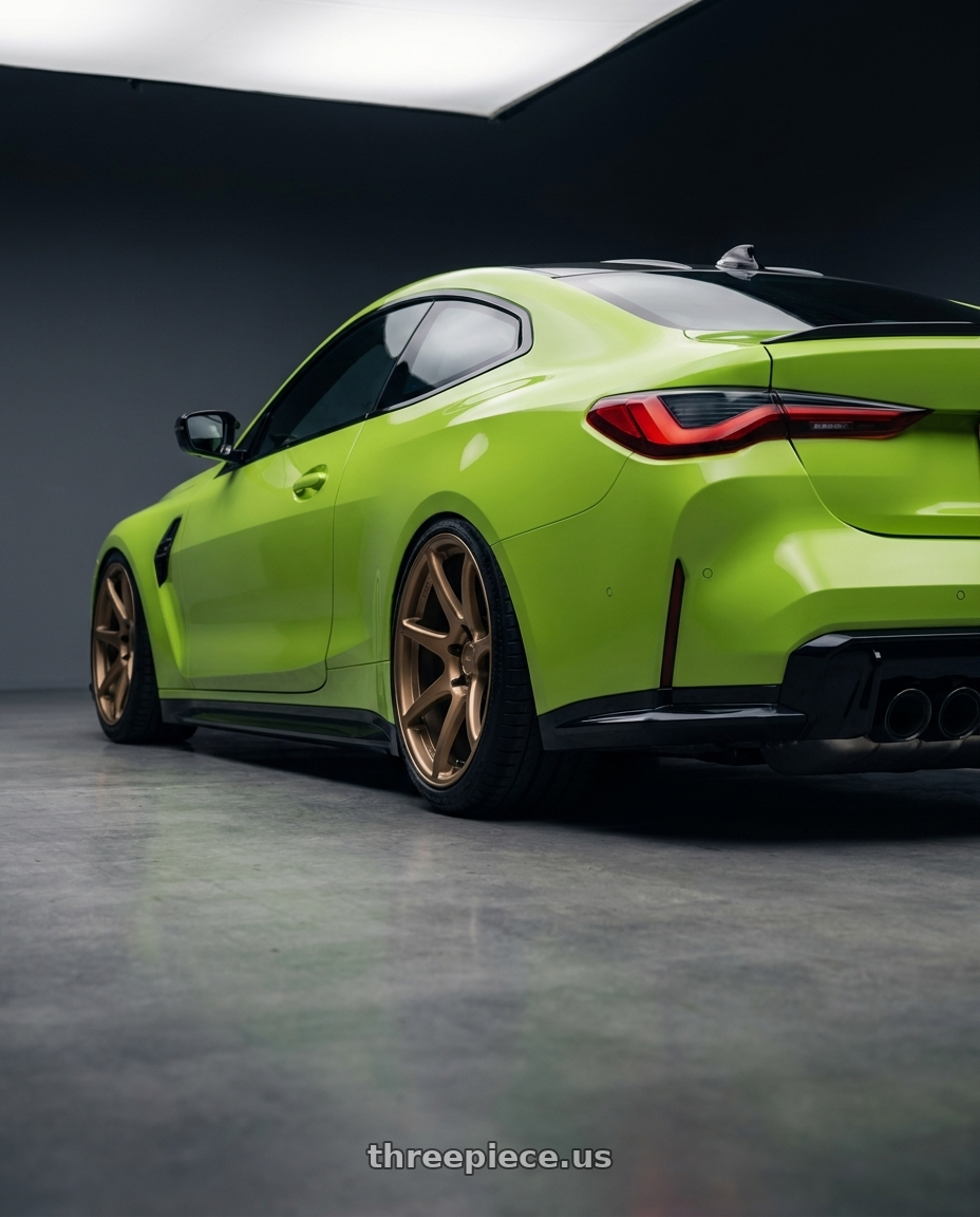 2024 BMW M4 G82 with Kansei K11B Tandem 5X112 19x10.5 22 Bronze wheels rear three quarter view slight stretch tires