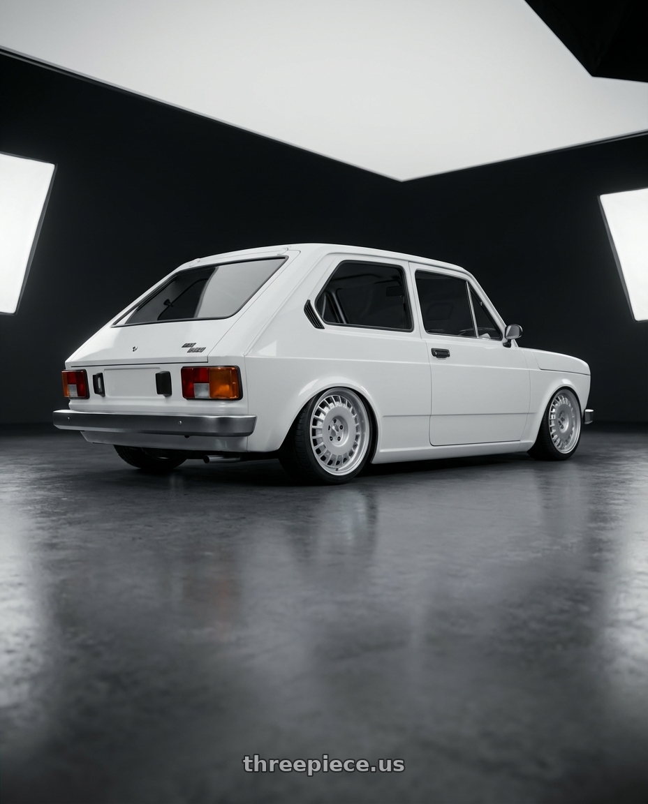 1979 fiat 147 with Rotiform RC205 PMF 5X112 18x8.5 +35 GLOSS SILVER wheels rear three quarter view square tires