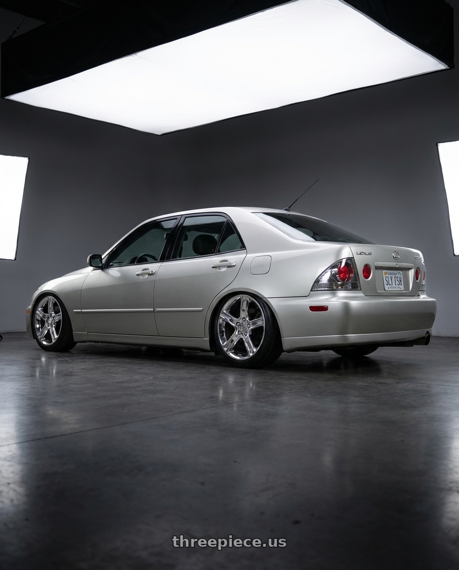 2001 Lexus is300 silver with OE Wheels LX01 5x114.3 17x7+50 Chrome wheels rear three quarter view slight stretch tires