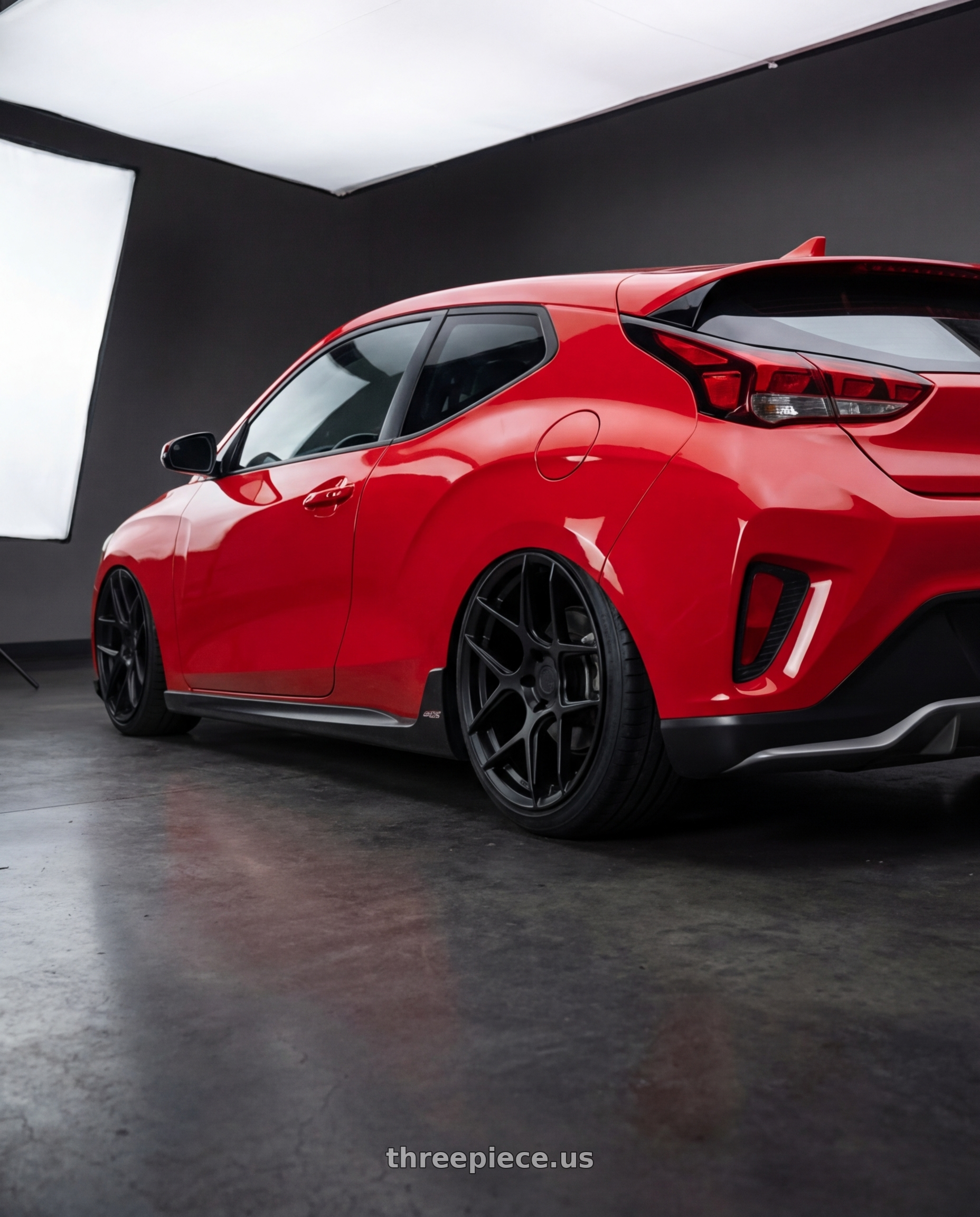 2022 Hyundai Veloster N with Aodhan AFF2 5x114.3 19x9.5+35 Matte Black wheels rear three quarter view slight stretch tires