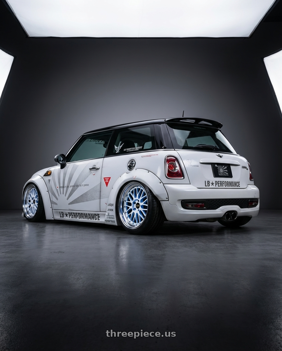 2009 Mini cooper with BBS LM 5x120 17x8.5 +18 White w/ Blue Metallic Flake / Diamond Cut Lip wheels rear three quarter view slight stretch tires