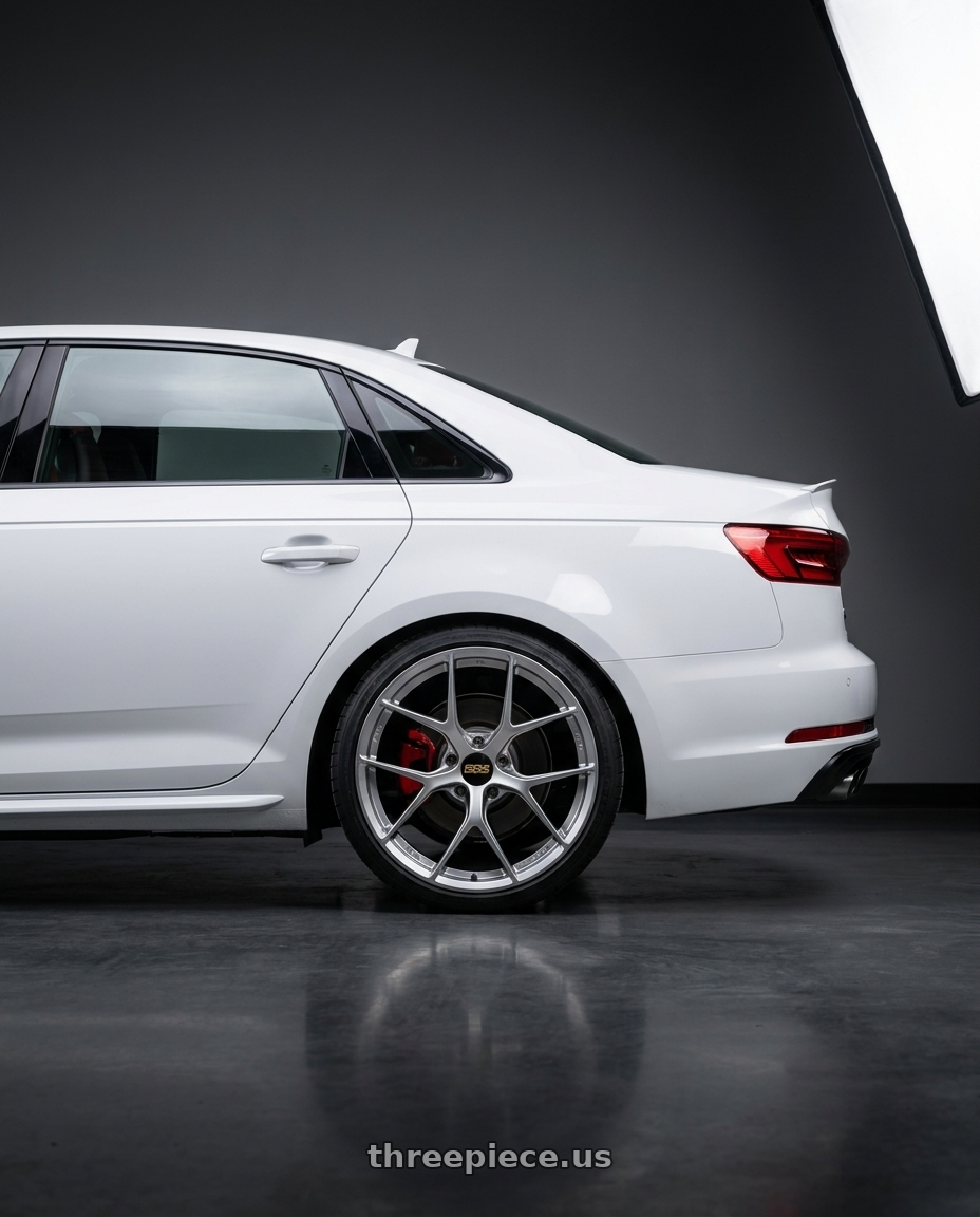2019 Audi s4 with BBS FI-R 5x120 19x10.5 +35 Silver wheels rear three quarter view square tires