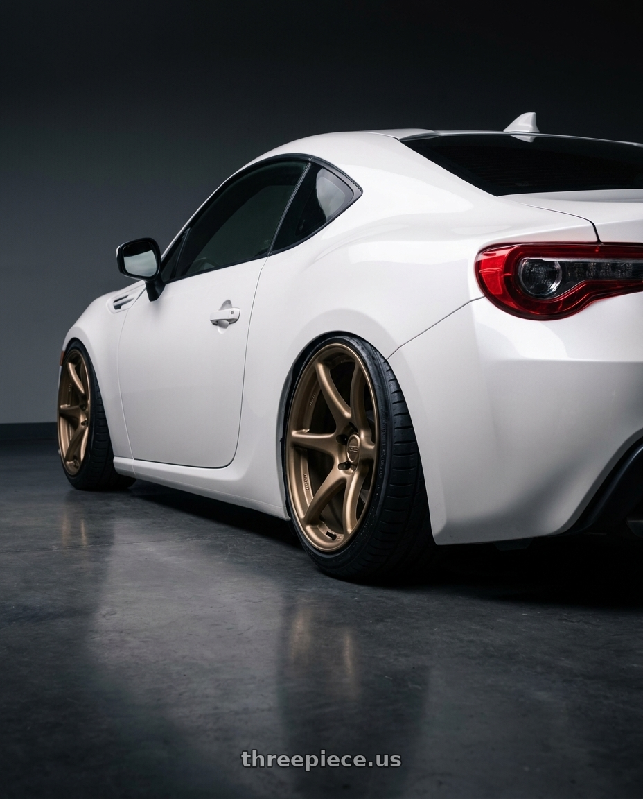 2016 Scion FR-S with Kansei K11B Tandem 5X100 18x9.5 22 Bronze wheels rear three quarter view slight stretch tires