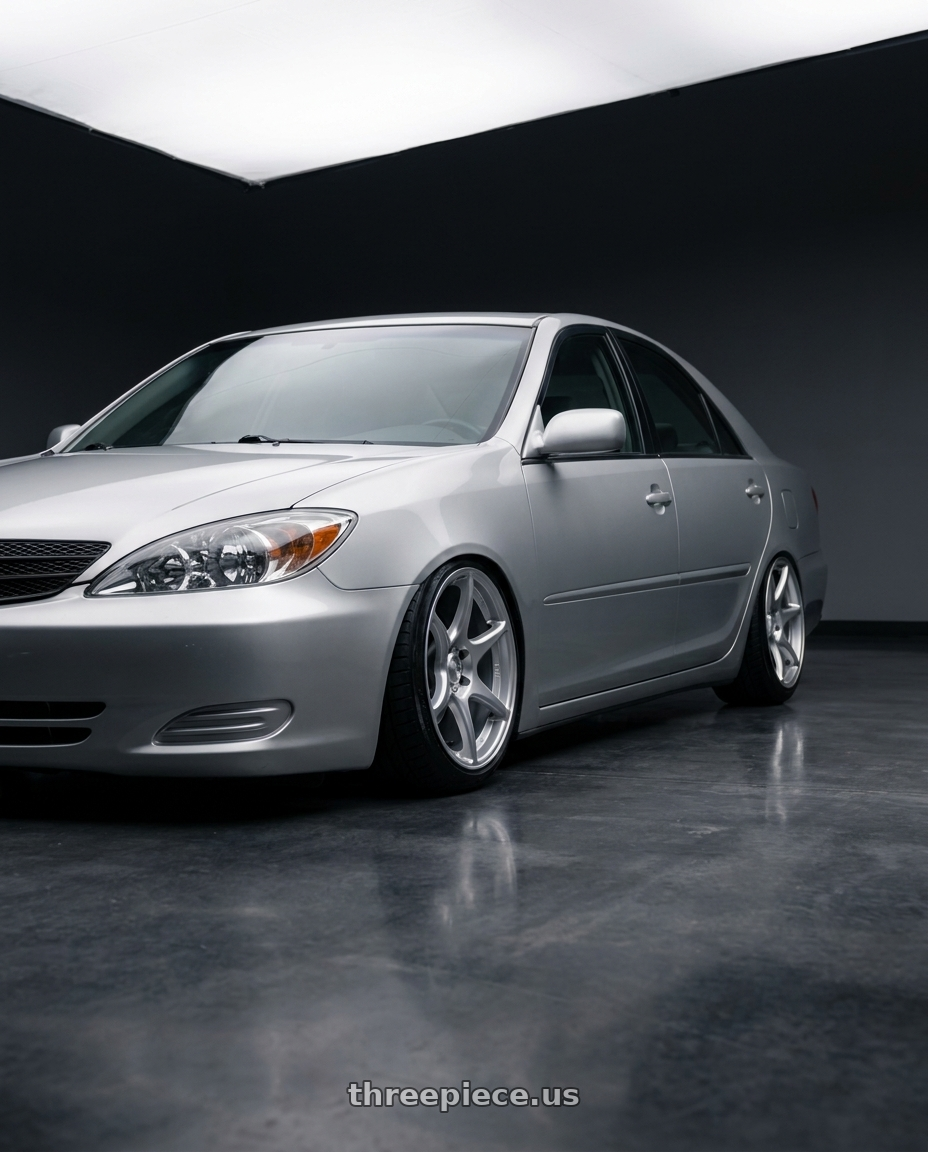2002 Toyota camry with Kansei K11S Tandem 5x114.3 17x9 35 Hyper Silver wheels