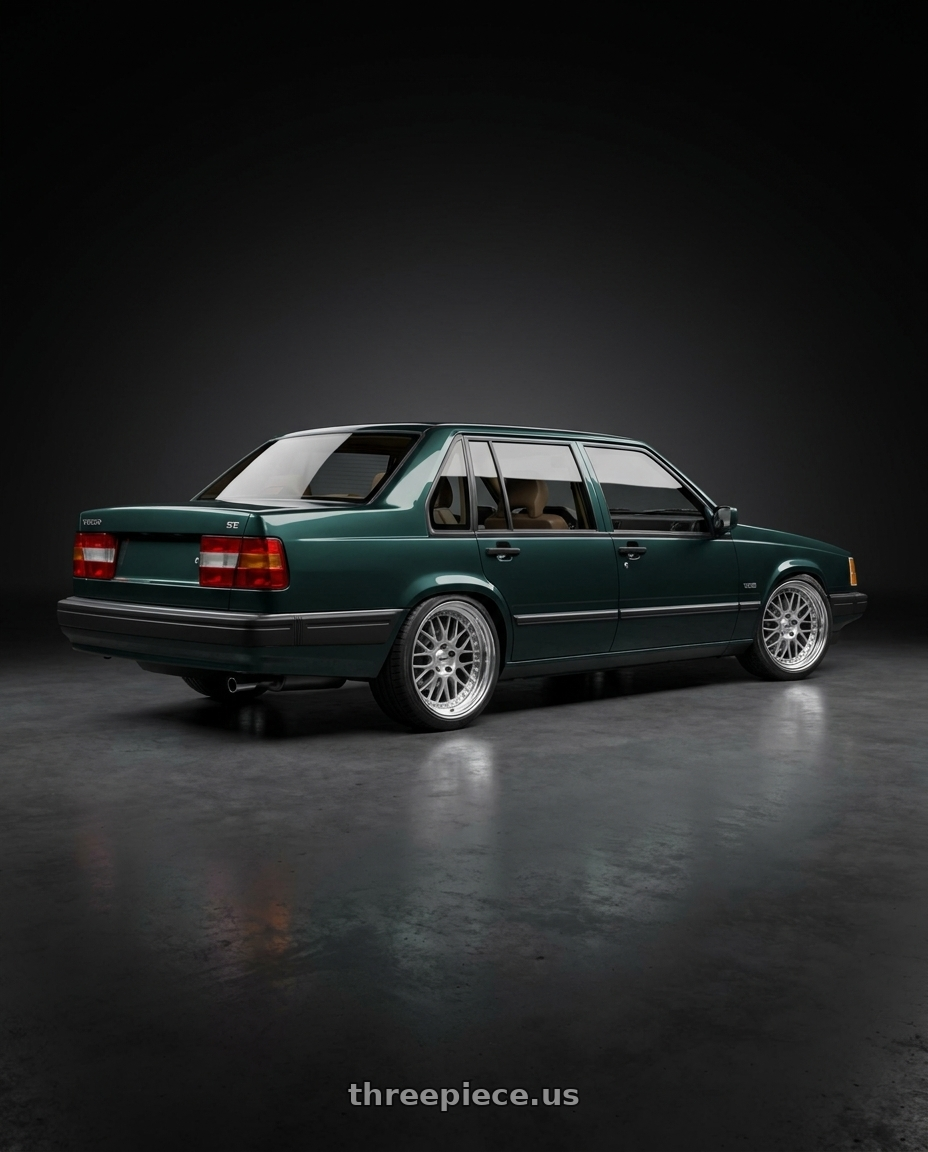 1991 volvo 940 se with Work Meister M1 3p 5x108 16x6.5+24 O Disk Silver wheels rear three quarter view slight stretch tires