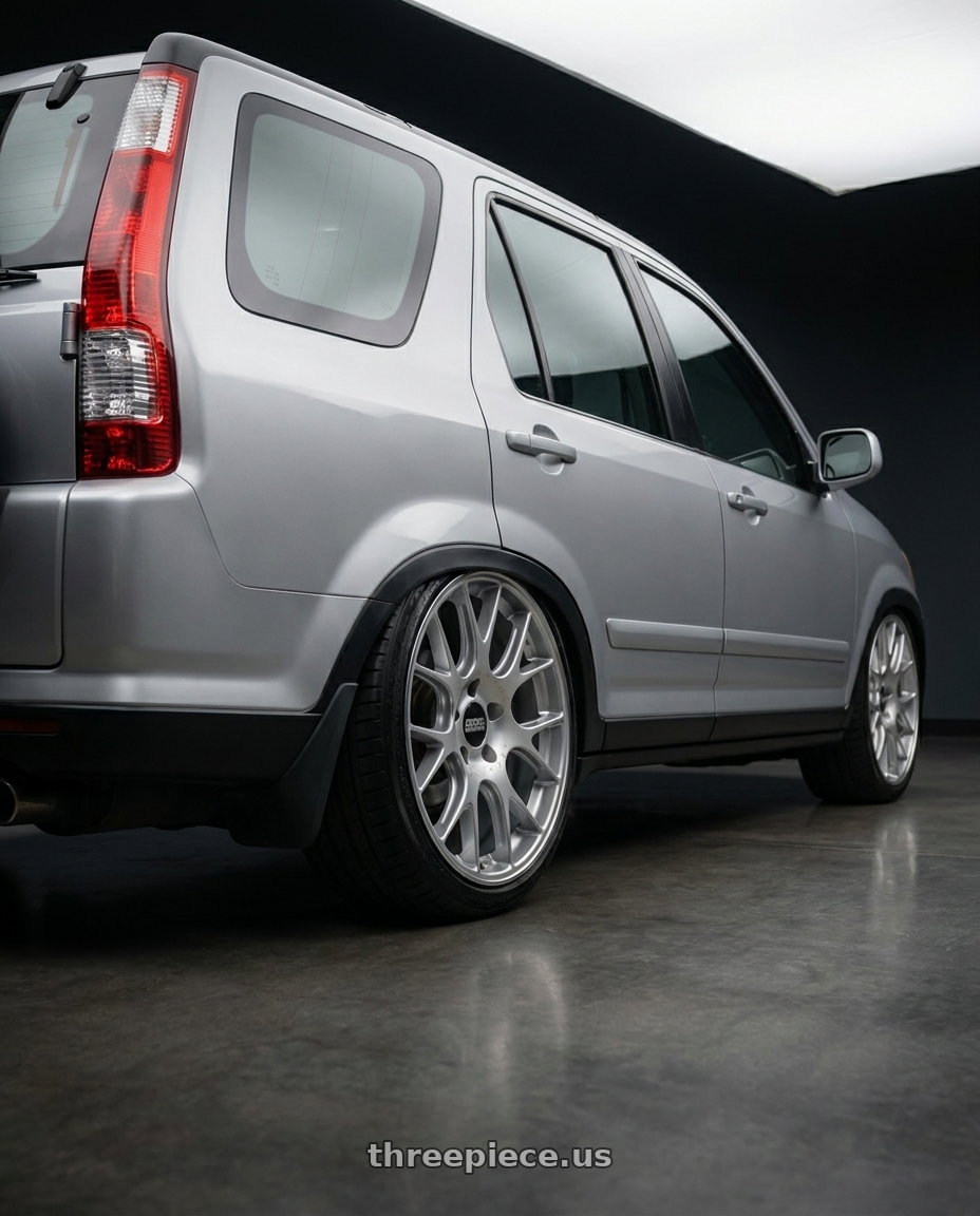 2004 Crv 2 with BBS CH-R 5x114.3 19x8 +38 Brilliant Silver Polished Rim Protector wheels rear three quarter view slight stretch tires