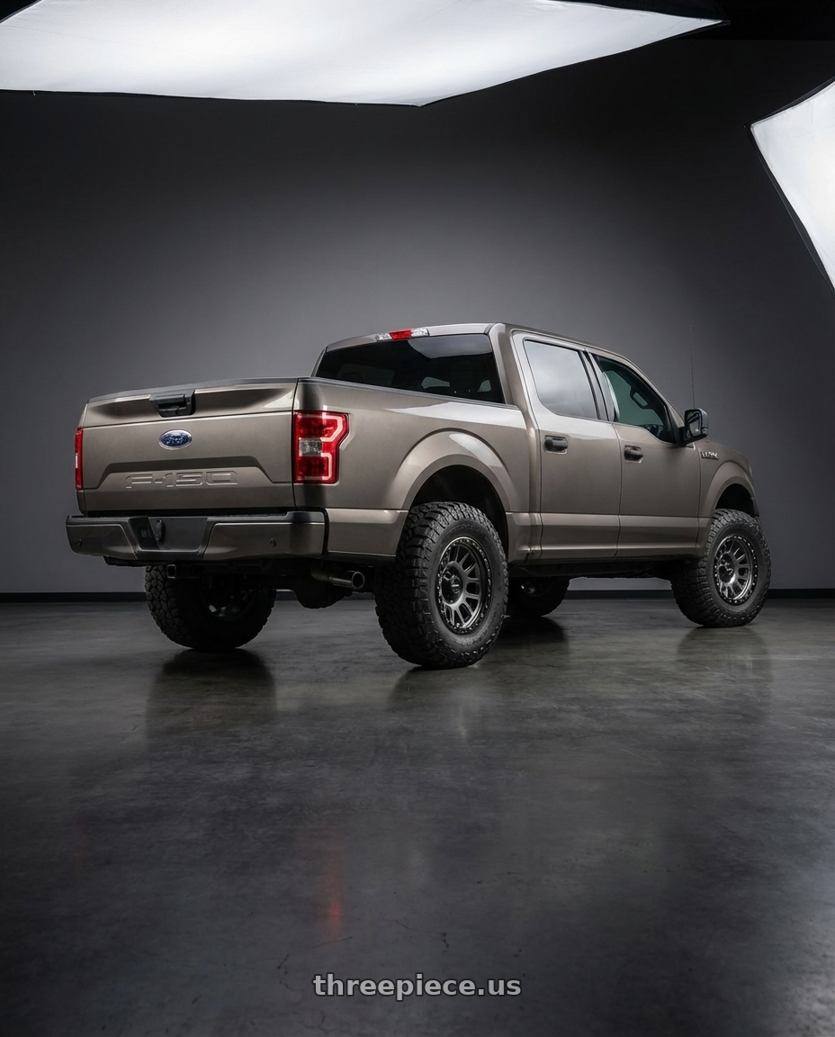 2019 Ford F-150 with Vision Off-Road 111 Nemesis 6x135 20x9+0 Gunmetal wheels rear three quarter view meaty tires