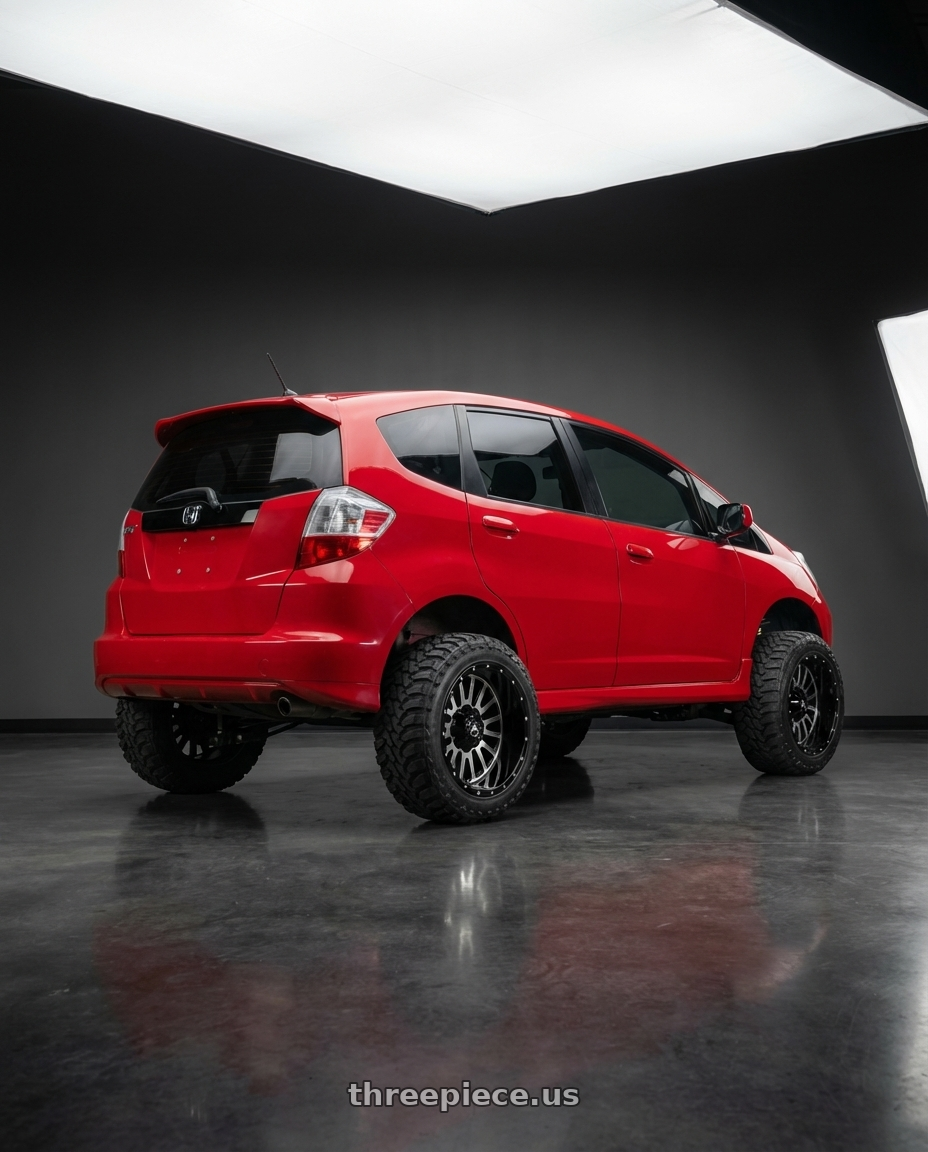 2011 Honda Fit Sport with American Off-Road A105 6x135/6x139.7 20x12 -44 Black Milled Spoke wheels rear three quarter view meaty tires